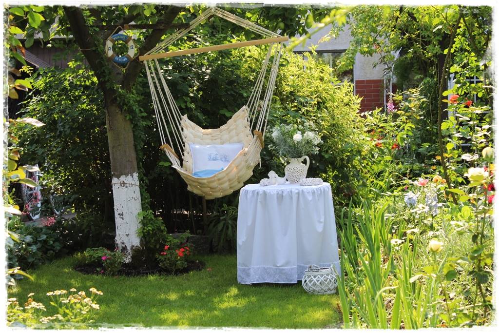 Fotel wiszący w ogrodzie 8